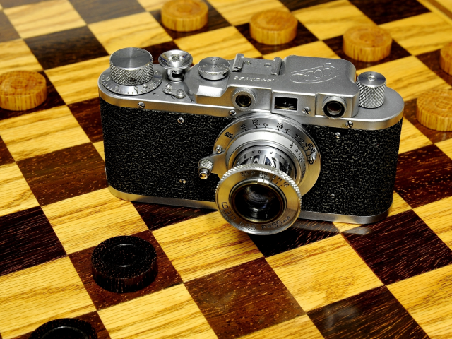 доска шахматная, фотоаппарат