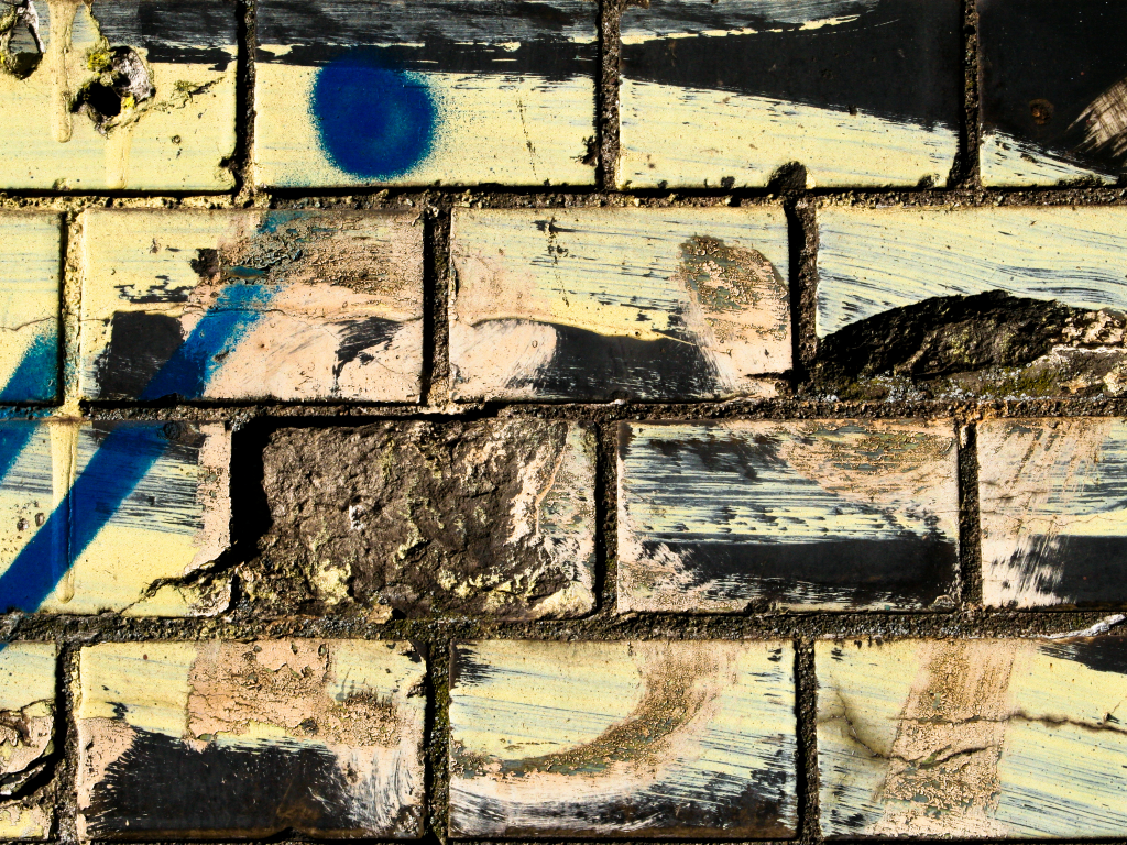 bricks, dirt, different colors, spray paint, wwall