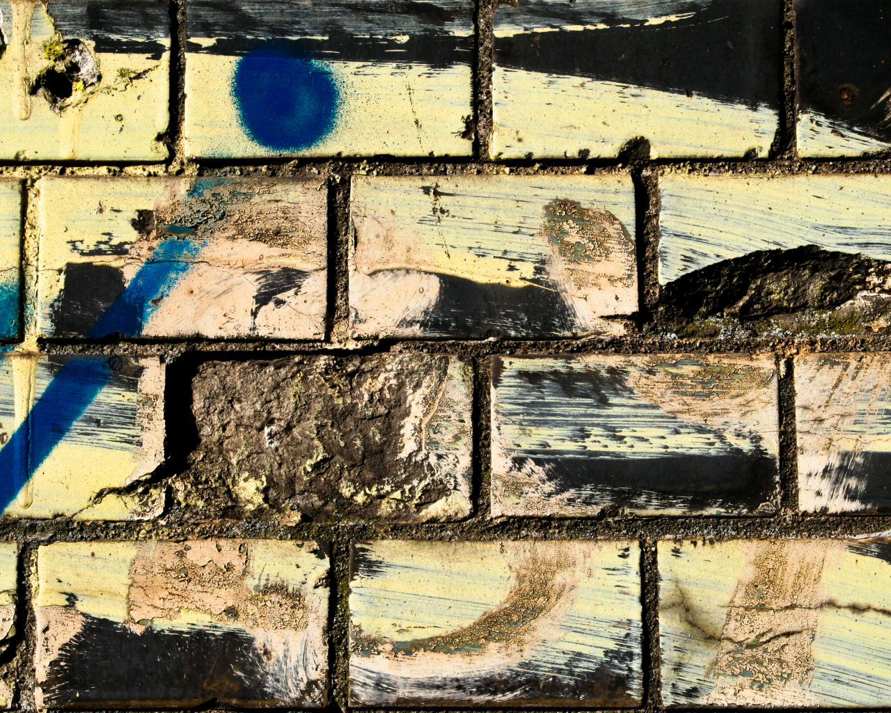 bricks, dirt, different colors, spray paint, wwall