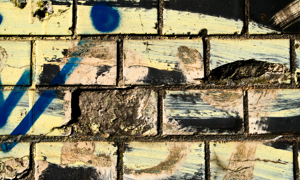 bricks, dirt, different colors, spray paint, wwall