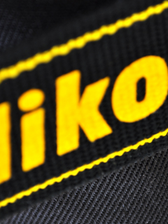 black, logo, yellow, nikon