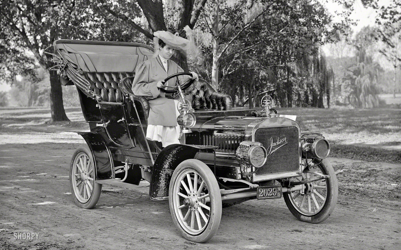 девушка, за рулём автомобиля jackson car