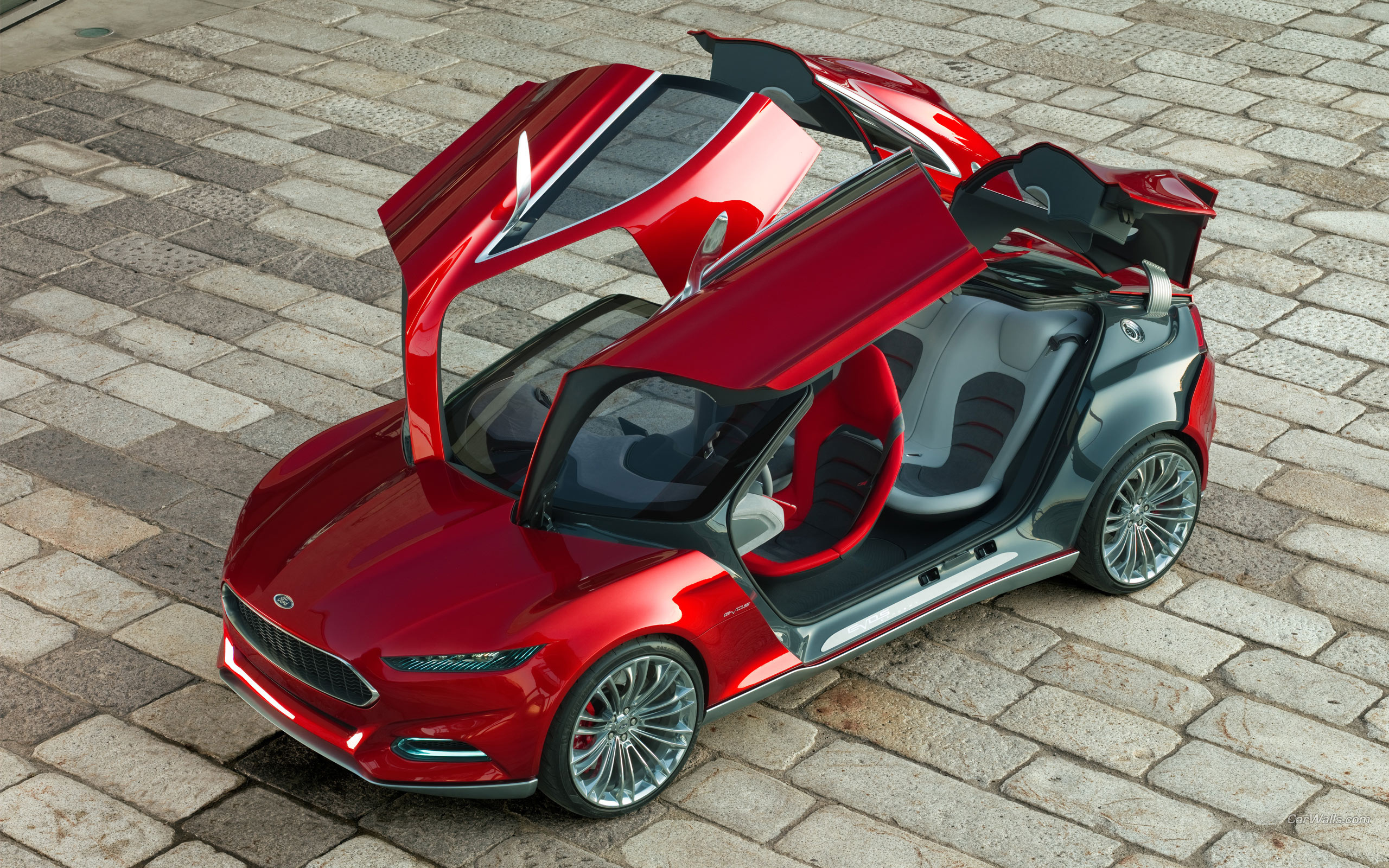 Модель современных автомобилей. Ford EVOS Concept 2011. Форд Эвос концепт. Ford EVOS (Concept car). Ford EVOS 2022 багажник.
