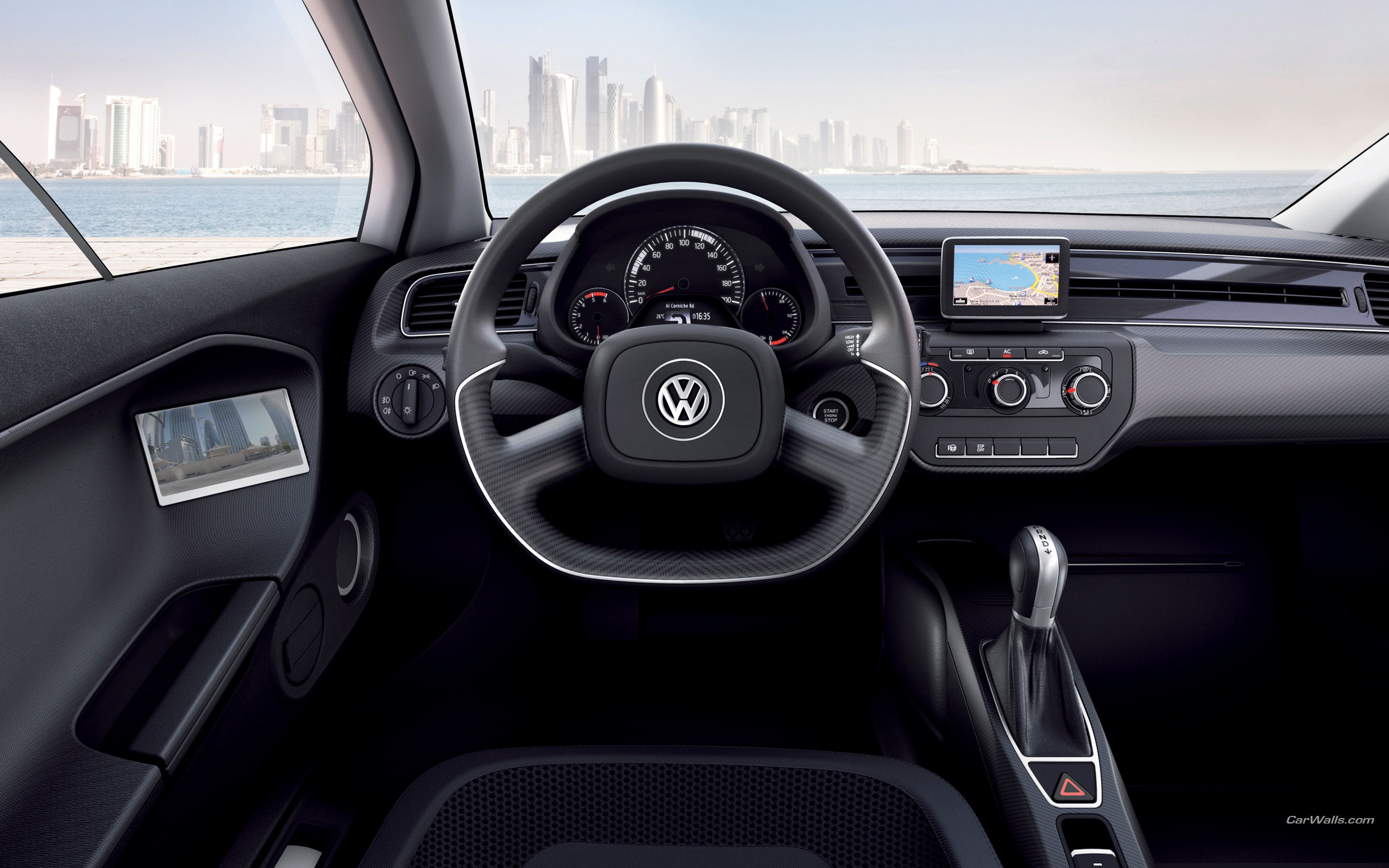 Volkswagen carplay. Фольксваген xl1 салон. Volkswagen xl1 Interior. Volkswagen ХЛ 1. Фольксваген xl1 Sport салон.