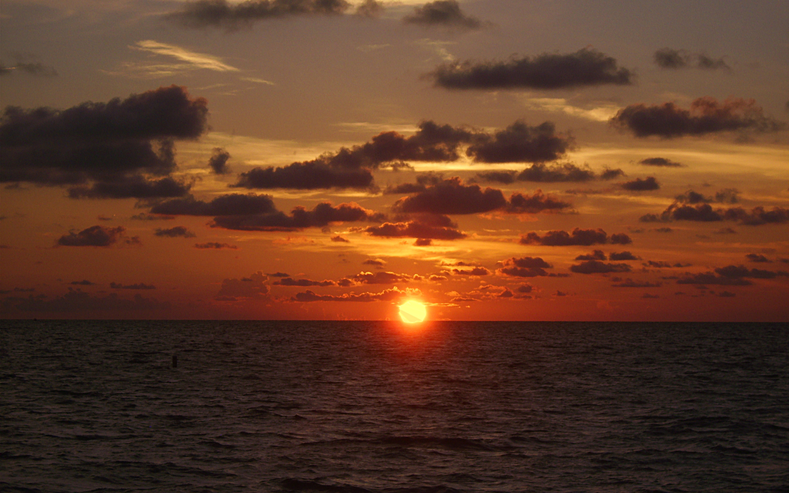 Фото заката на море качественные