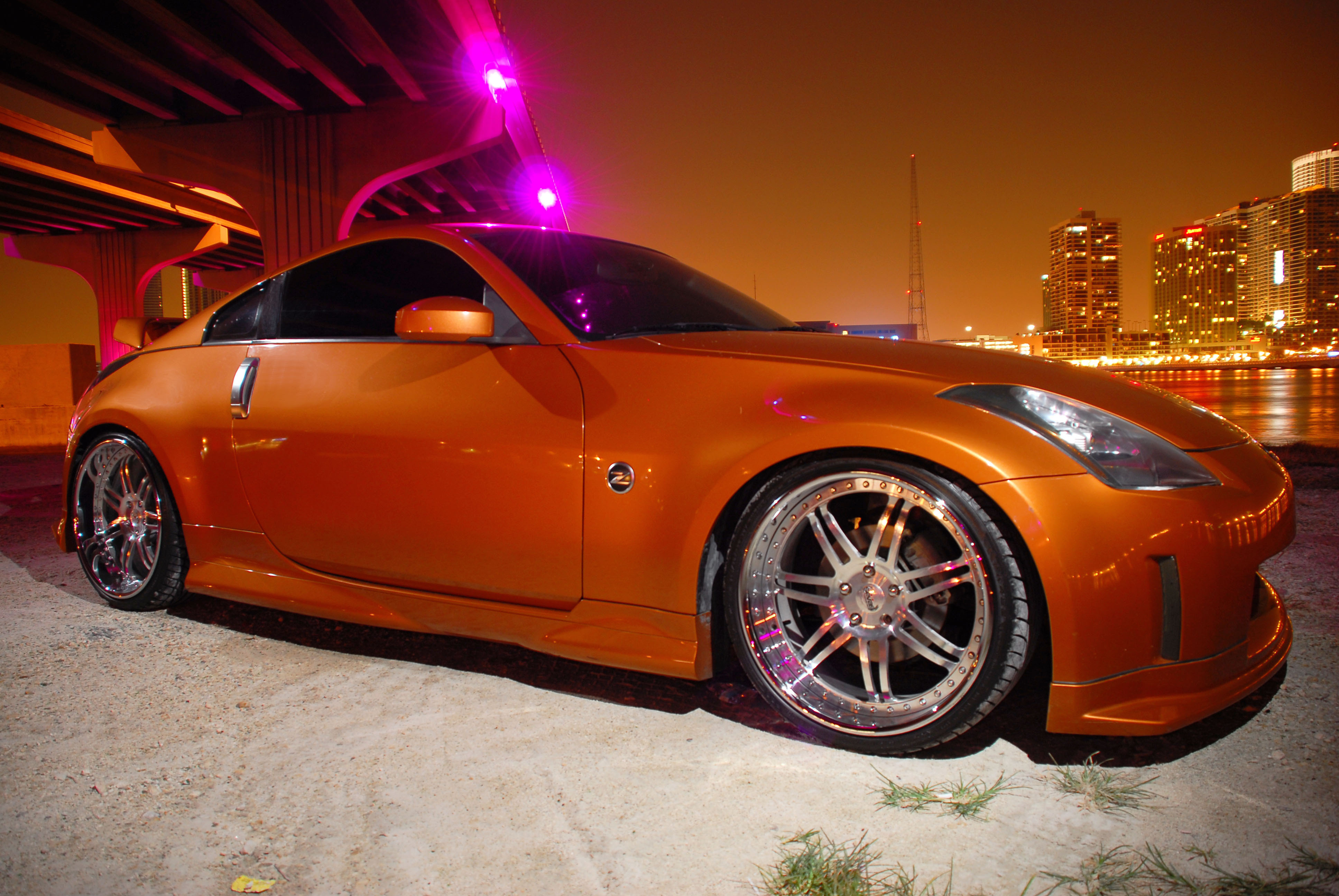 Z tuning. Nissan 350z. Ниссан 350z оранжевый. Nissan 350z Wheels. Золотой Ниссан 350z.