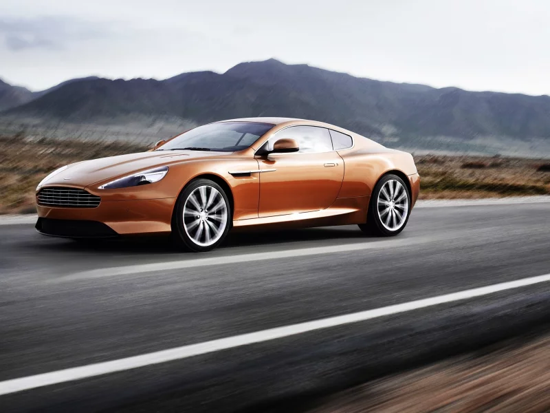 природа, автомобиль, диски, aston martin, горы, virage, дорога, небо, мчится, размытие, скорость