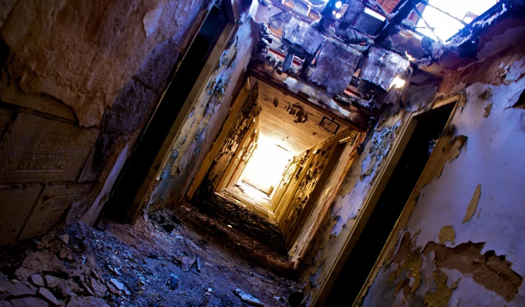 fallen roof, ruin , halls, doors, light at the end of the tunnel, dirt, heater, peeling walls