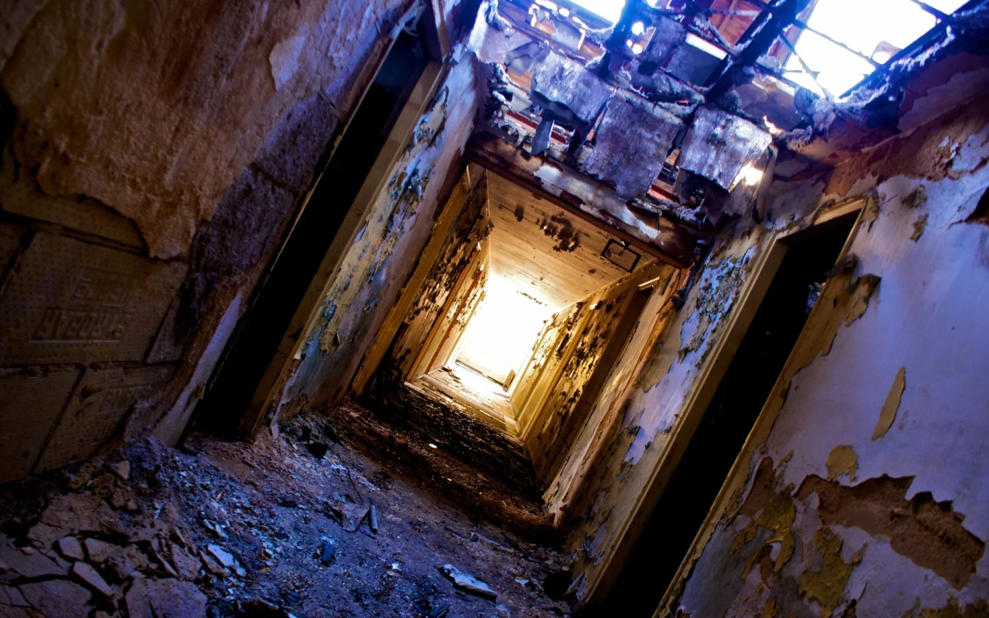 fallen roof, ruin , halls, doors, light at the end of the tunnel, dirt, heater, peeling walls