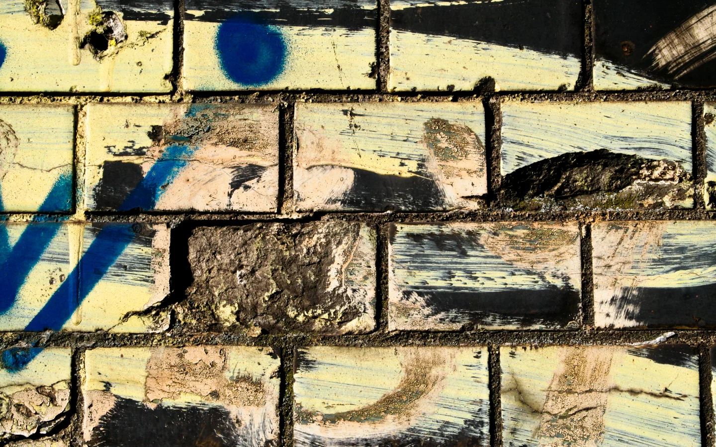 bricks, dirt, different colors, spray paint, wwall