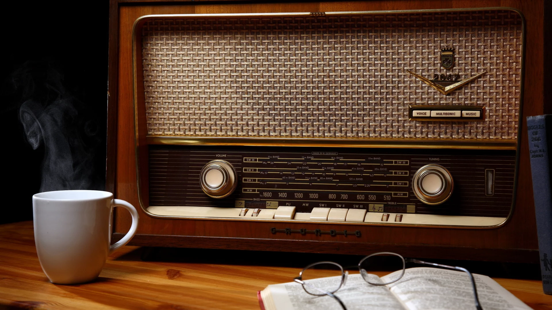 book, cup, glasses, old radio, wood, table