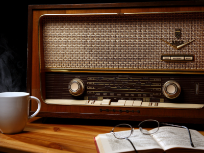 book, cup, glasses, old radio, wood, table