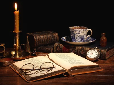 стол, свеча, очки, книги
