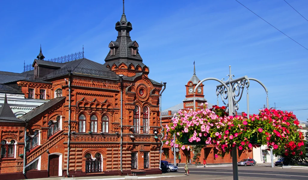 город