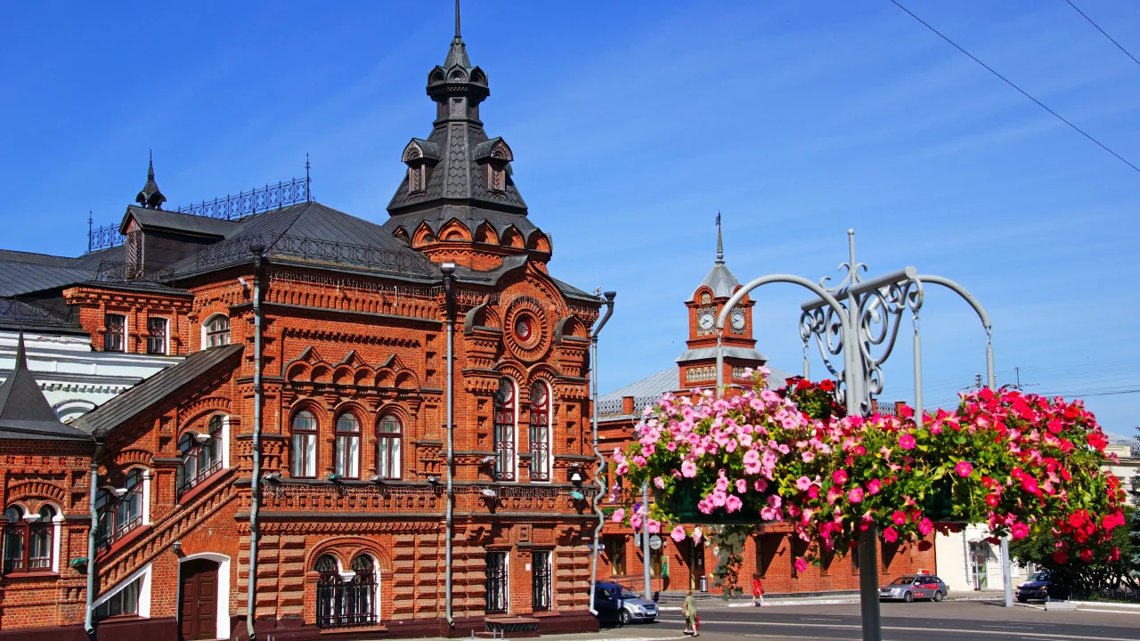 город