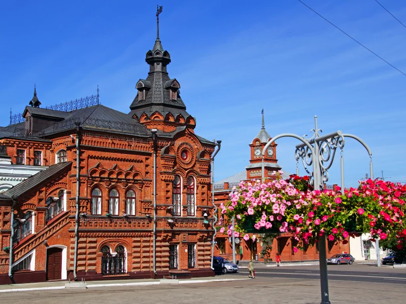 город
