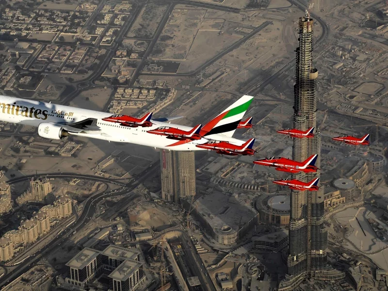 Aircraft above skyscrapers in Dubai