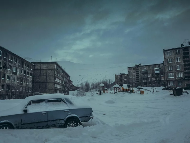 город
